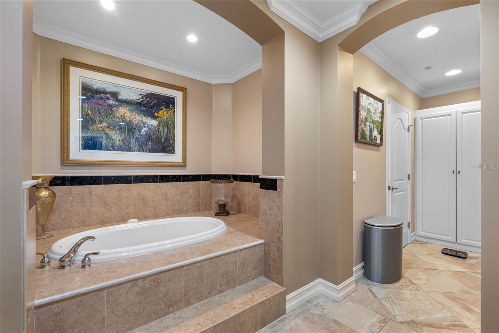 ...Stepped Up  Jacuzzi Soaking Tub - Master Retreat.. The Master Bathroom Suite is A Wonderful Thing. Nothing is Missed Here. Privacy Room on Left & Walk In Shower on Right. Well Laid Out.