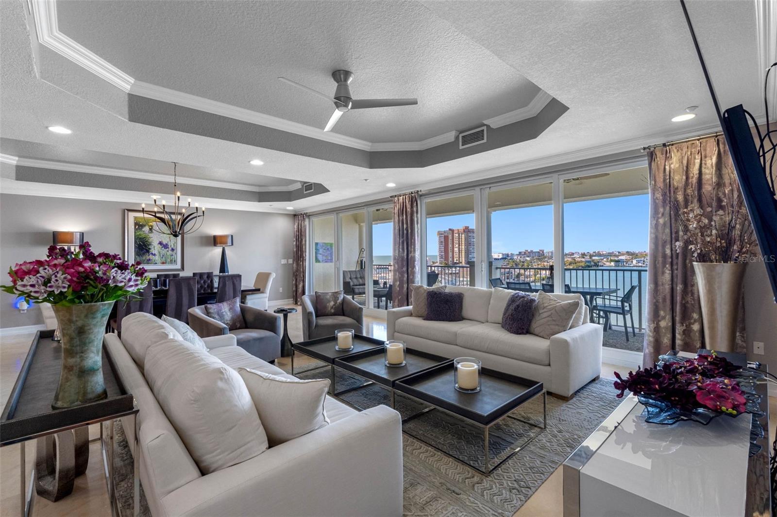 .. Back To Living Room -- Executive PH Residence 702 Consists of  3990 Sq Ft of Living Space With 4 Bedrooms - 3.5 Bath -  Plus an Art Studio / Den.  All Fronted By a 60 Ft Waterfront Terrace With Long Range Gulf & Intracoastal Water Views.