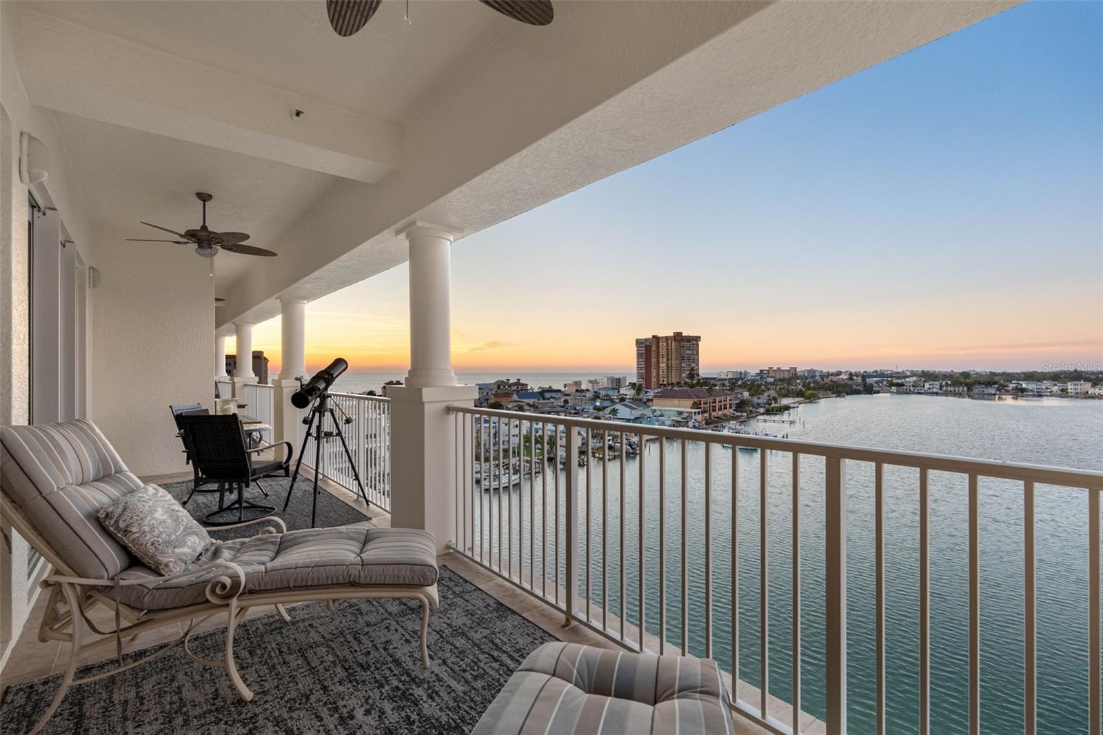 .. Long Range Gulf & Intracoastal Views. The Nighttime Sunsets and Skyline Views are Awesome. Original Owners Specifically Picked the Location For Optimum Gulf & Intracoastal Views. Exec PH 702 is the Only Unit in Complex With 4 Bedrooms Plus an Office / Art Studio. Photo Here Was Taken Outside The Master/ Primary Suite.