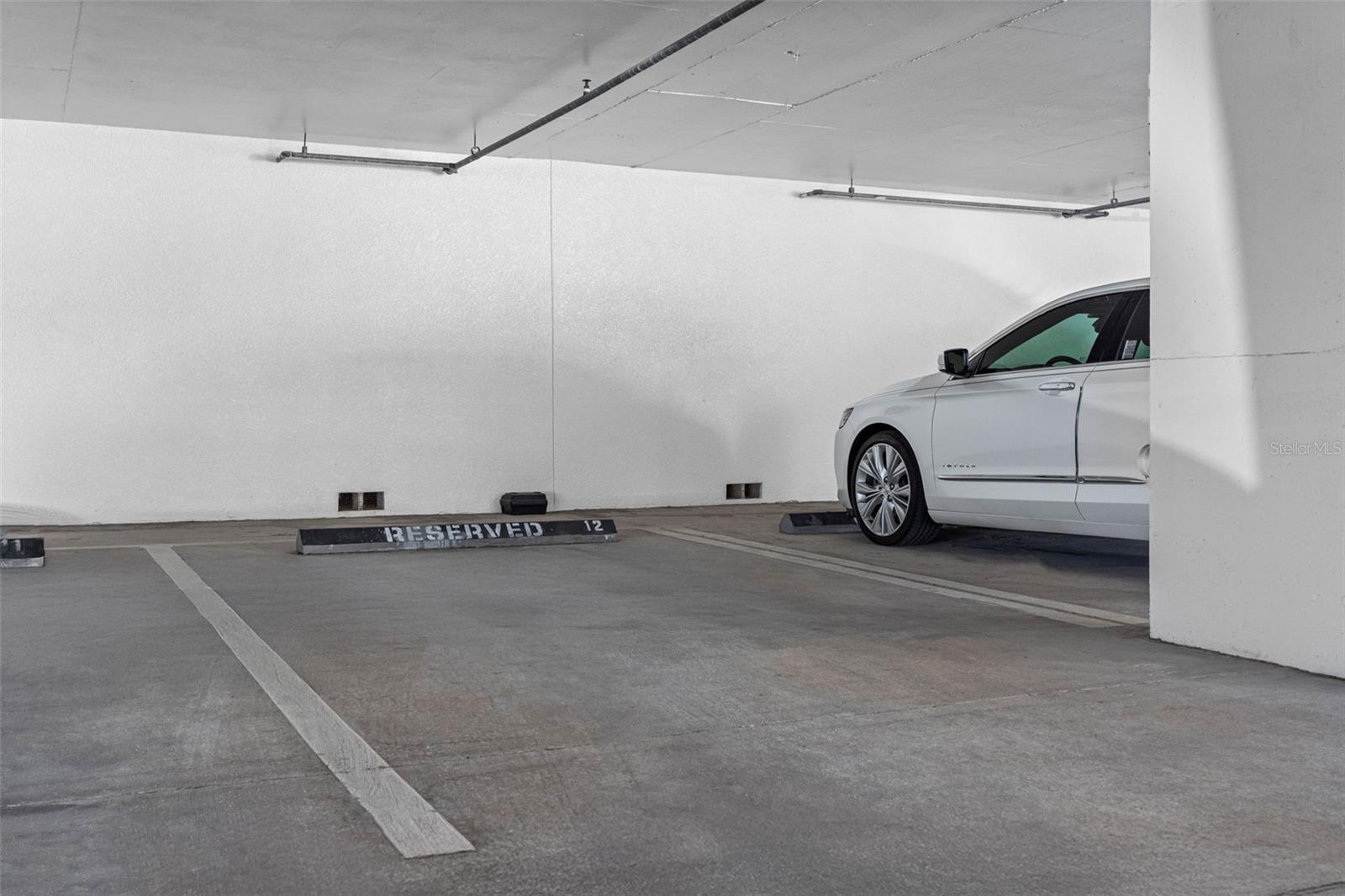 ... Under Building Space 12 Conveys With PH 702..  Plus 2 Other Rare Covered Spots #37 And #38 By Lobby Under an  Awesome Concrete Aesthetically Pleasing Structure.