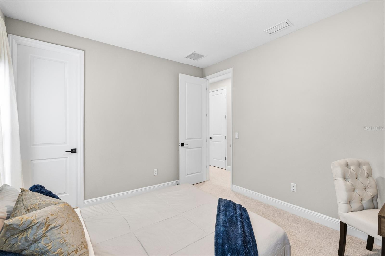 Middle Secondary Bedroom with Walk-In