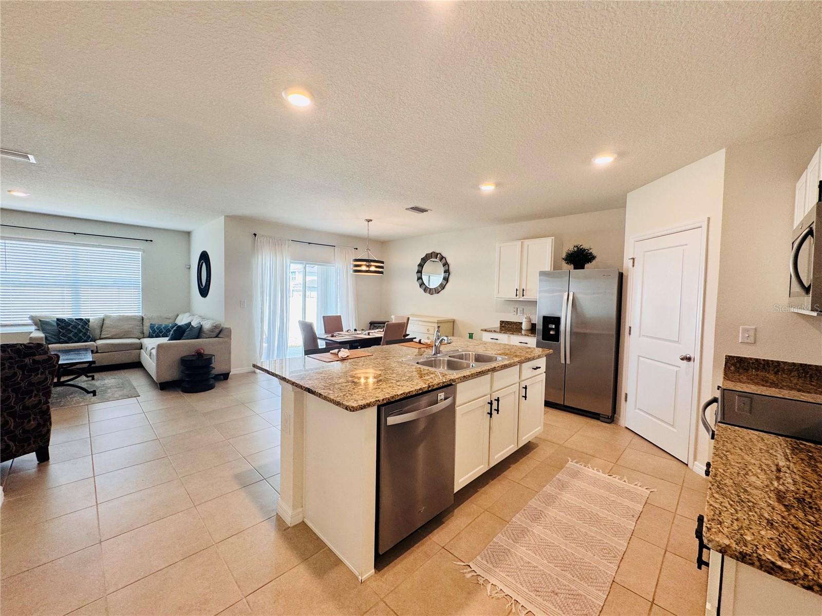 Kitchen - Living Room - Dining Area