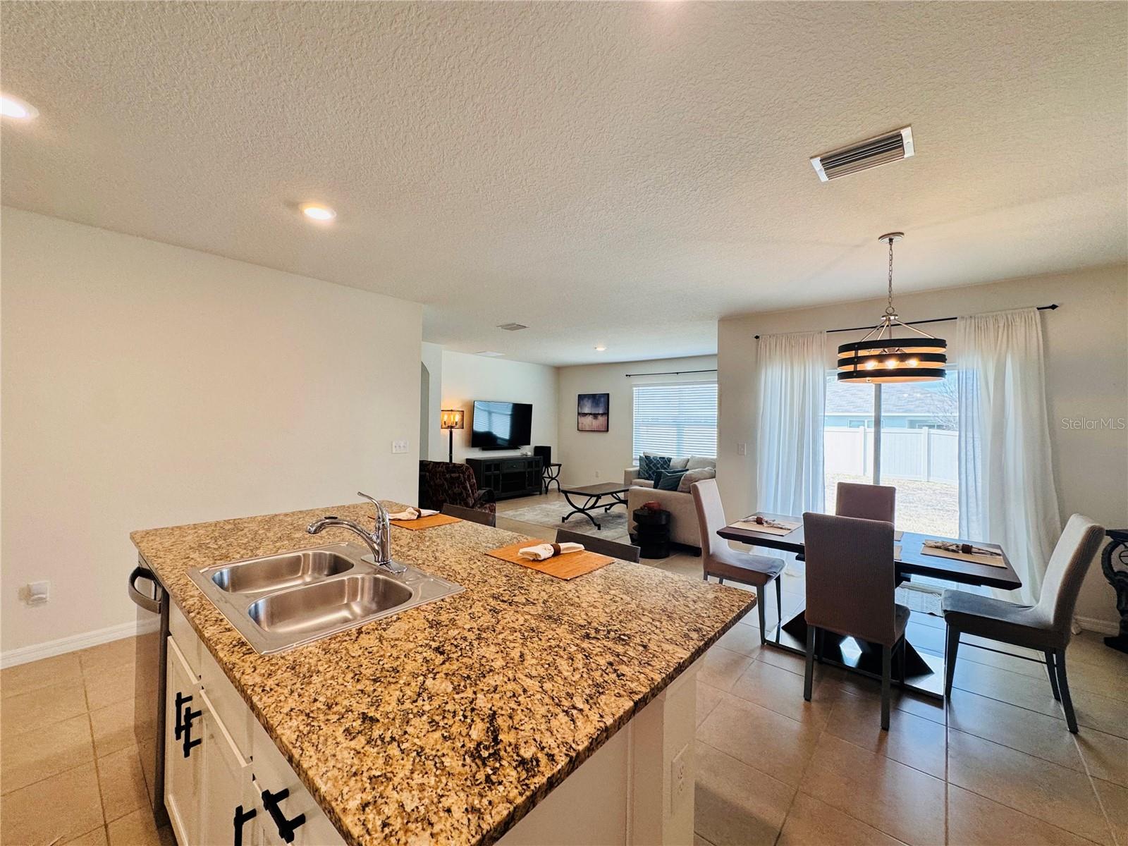 Kitchen - Living Room - Dining Area