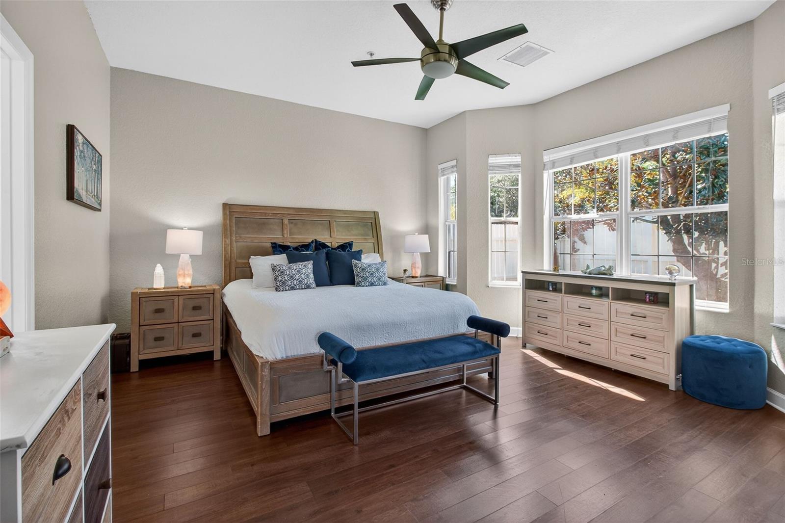 Large primary bedroom with ensuite bathroom and walk in closet.