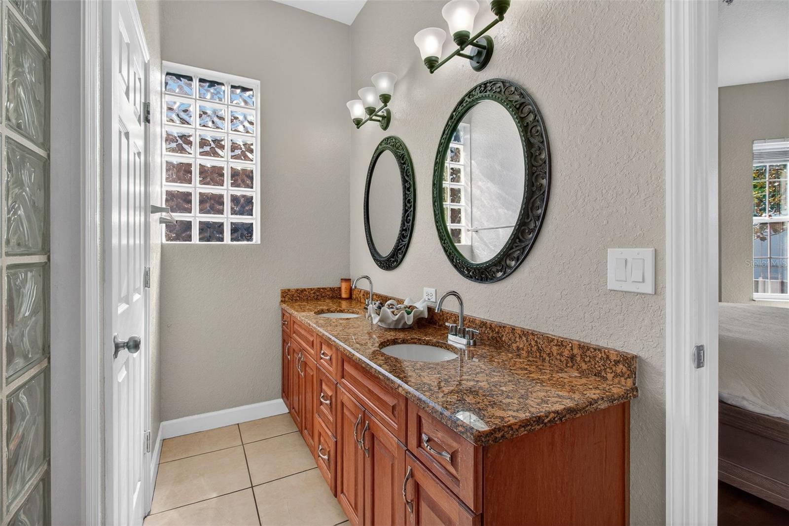 Primary bathroom with dual sinks.
