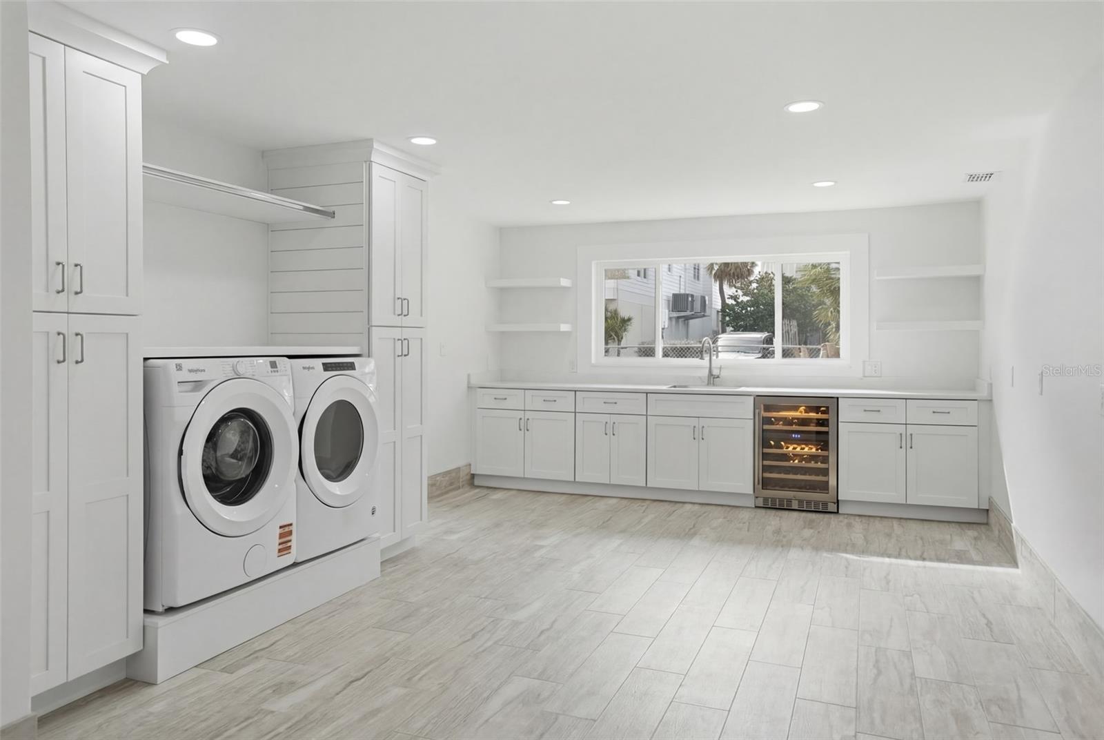 Expansive Laundry Room with Endless Possibilities