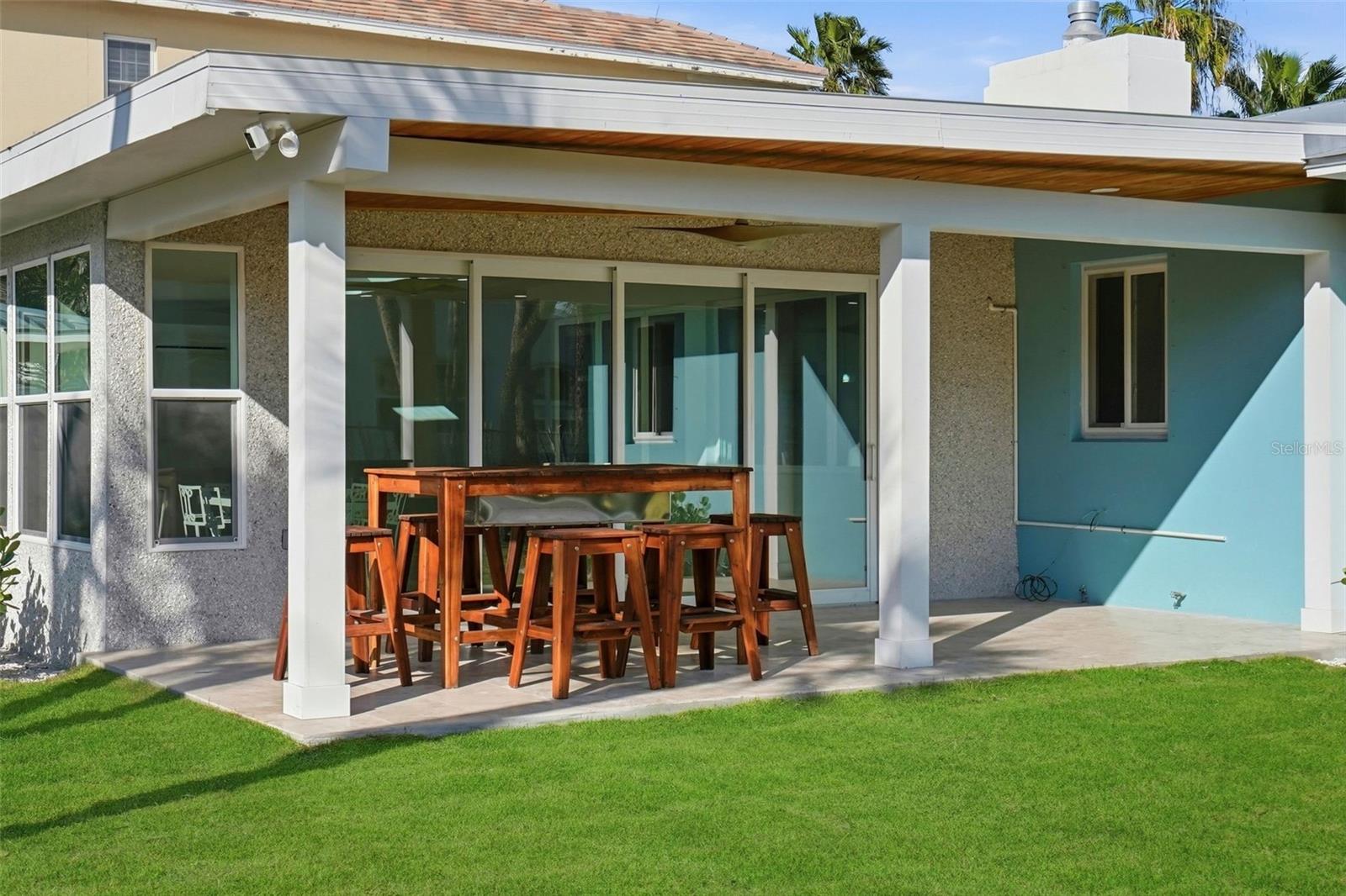 Covered Patio Overlooking the Expansive Backyard