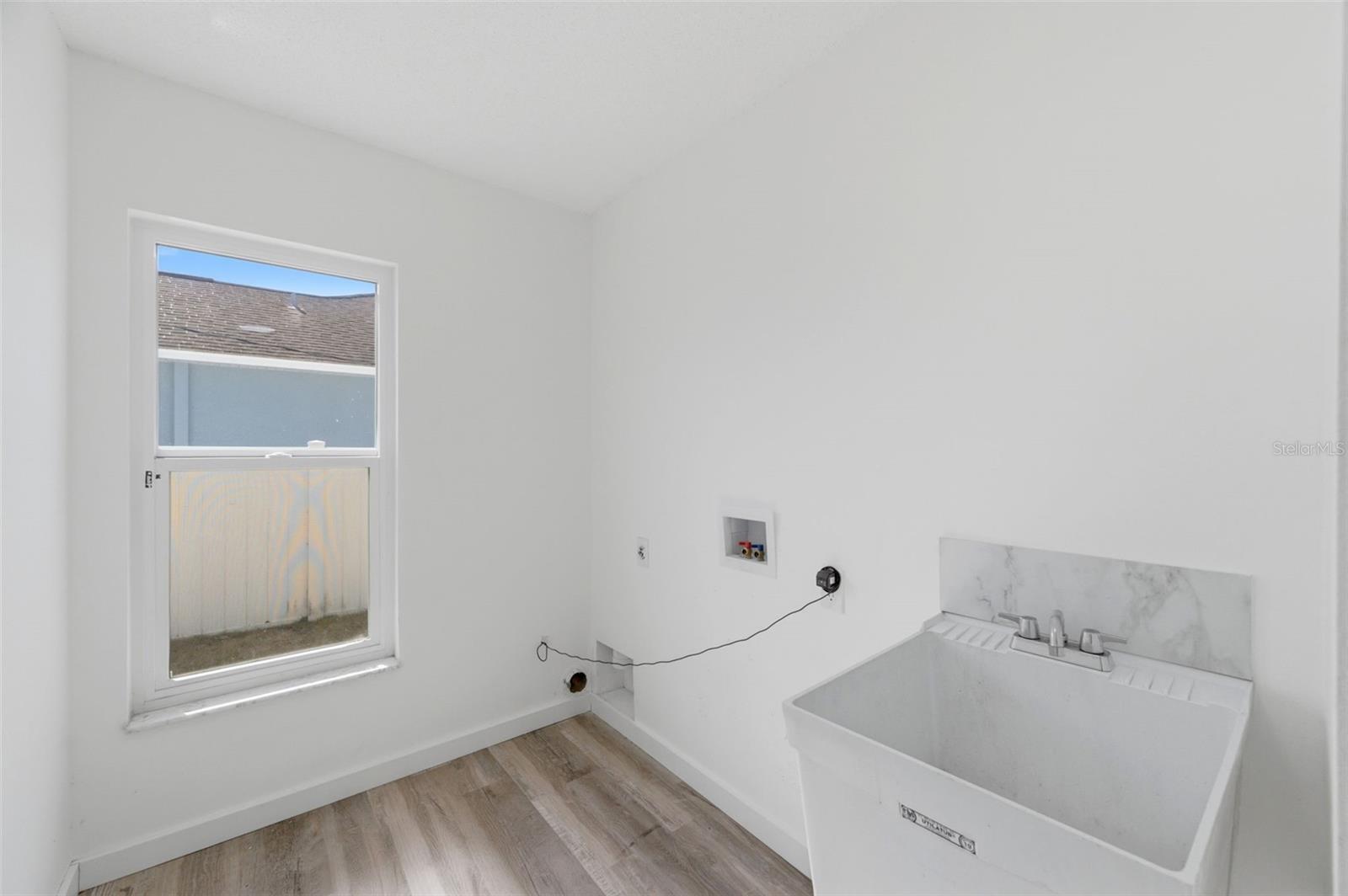 Over sized interior laundry room.