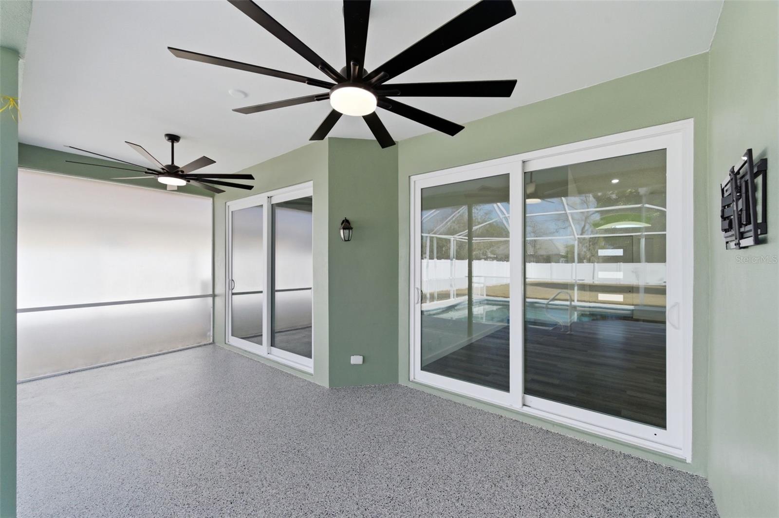 Master bedroom has sliding doors for a midnight swim.