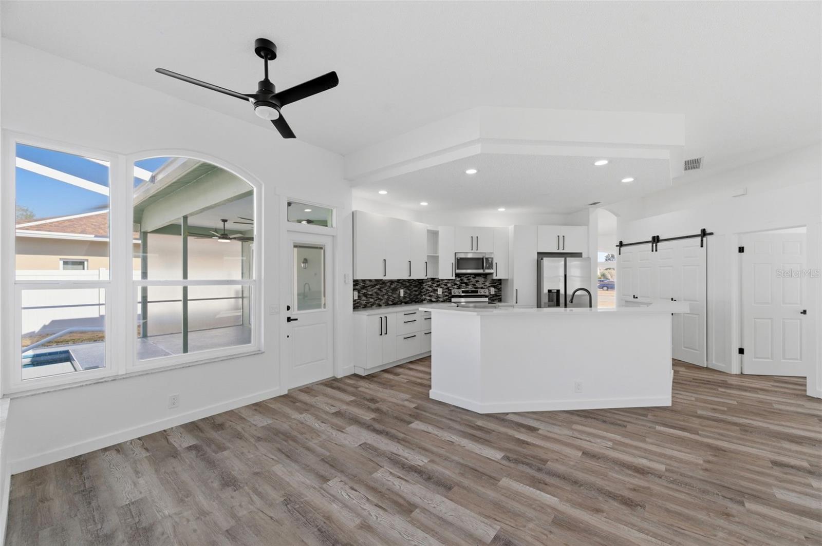 Dinette and kitchen open to family area.