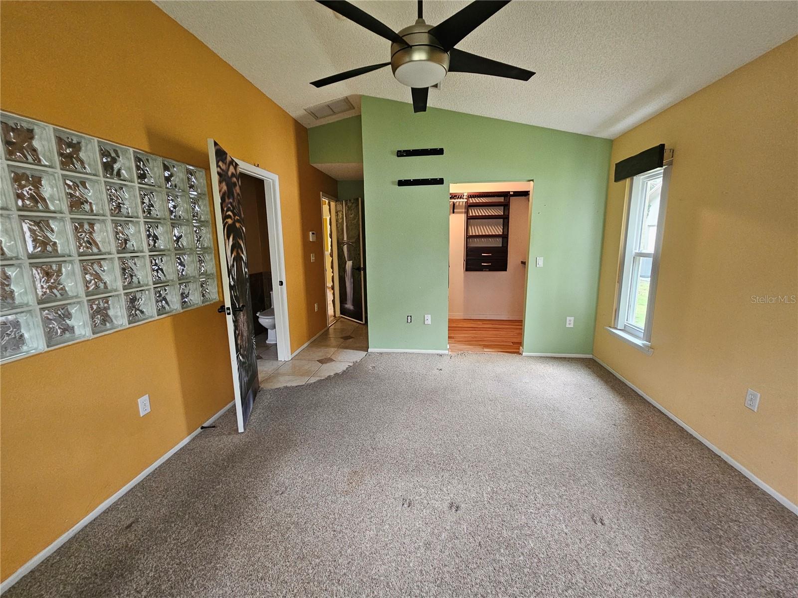 Primary Bedroom with walk-in closet