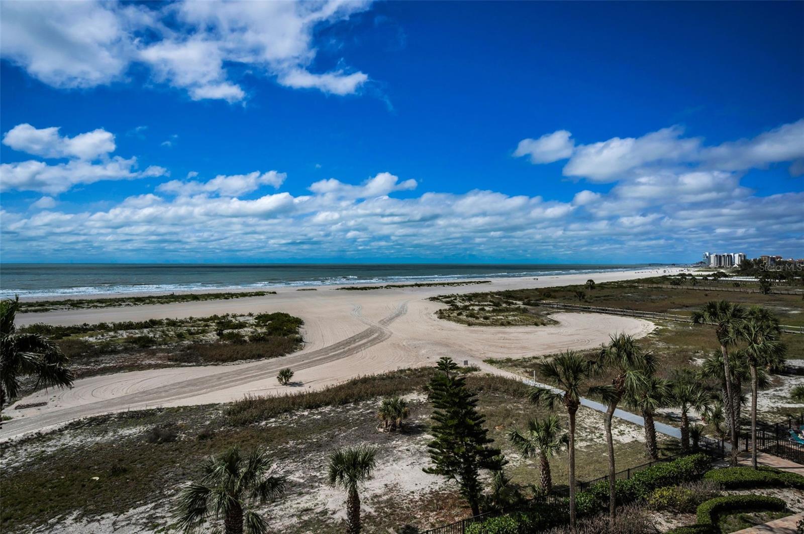 Beachfront View off the Balcony and from the Living and Primary Bedroom
