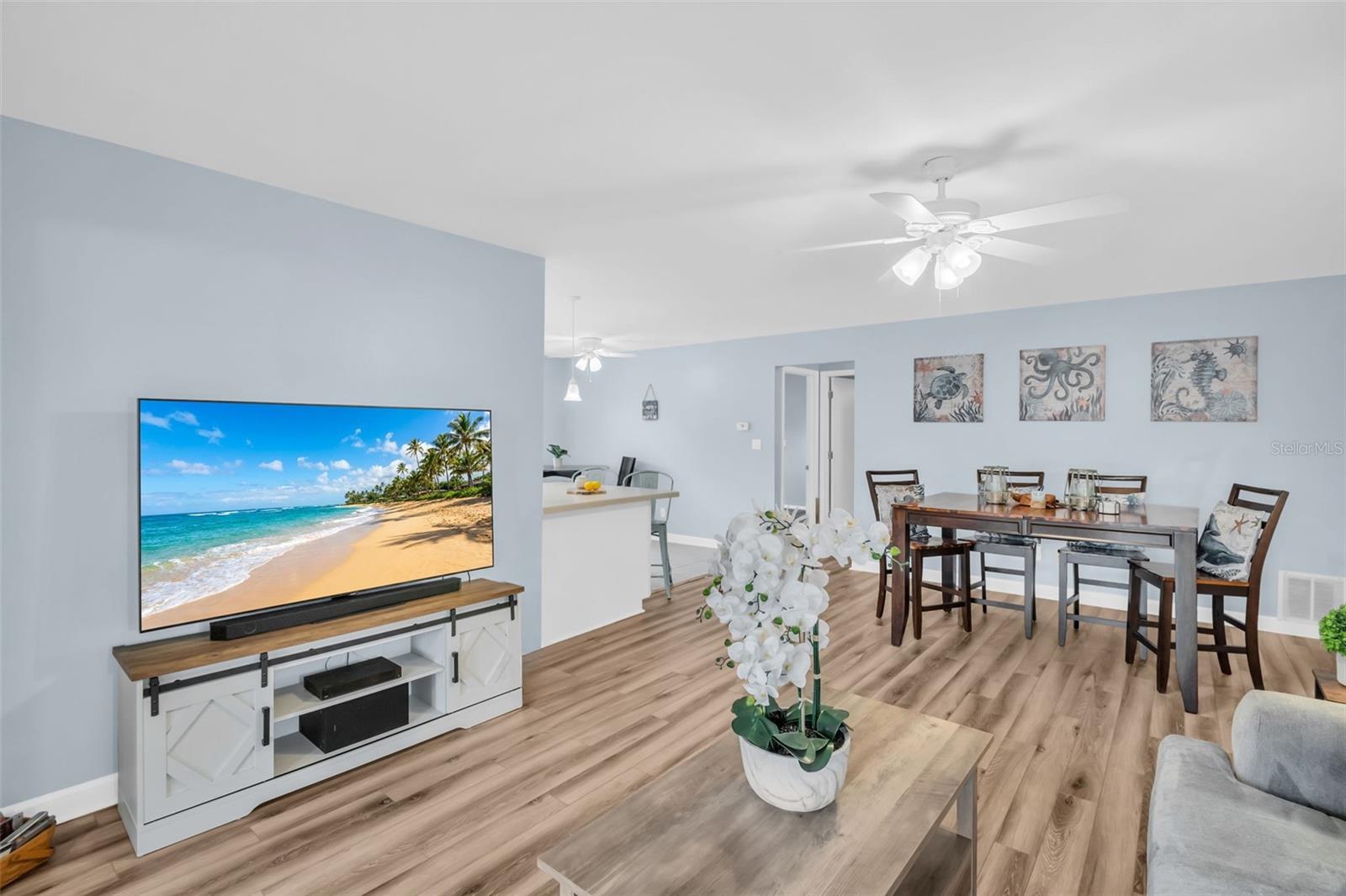 Newer luxury vinyl plank flooring flowing seamlessly throughout~