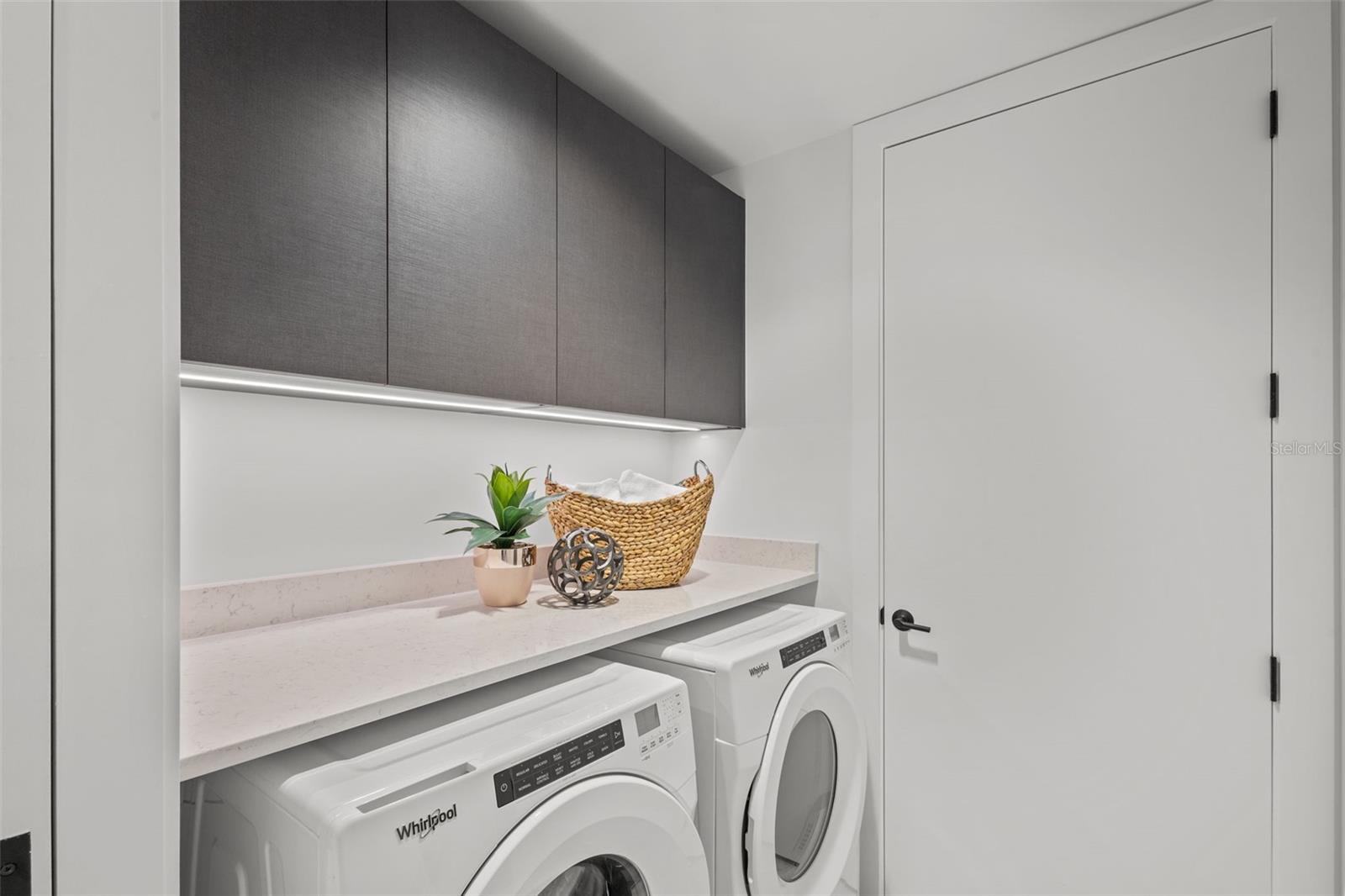 In-unit laundry thoughtfully designed for everyday convenience and functionality.