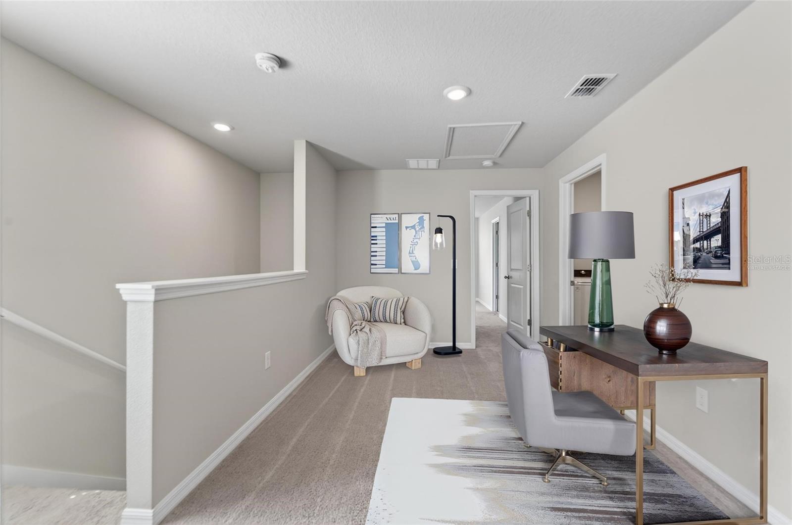 Loft/Bonus area upstairs-Virtually staged