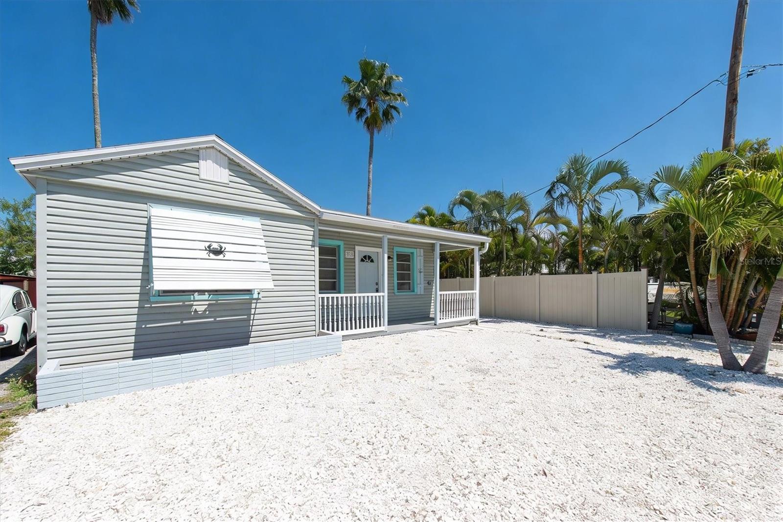 Front Exterior with crushed shell for low Maintenance