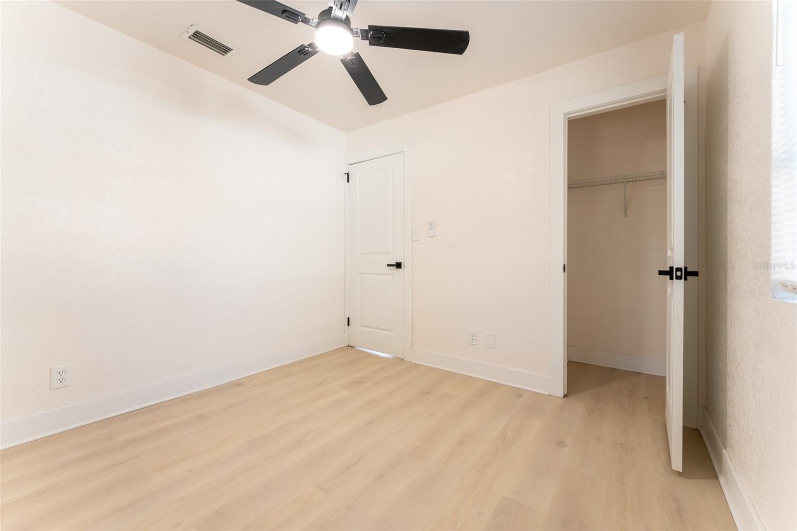 Bedroom #2 - Bright bedroom featuring dual windows for natural light, updated finishes, and dedicated closet space. Comfortable layout with flexibility for various setups.