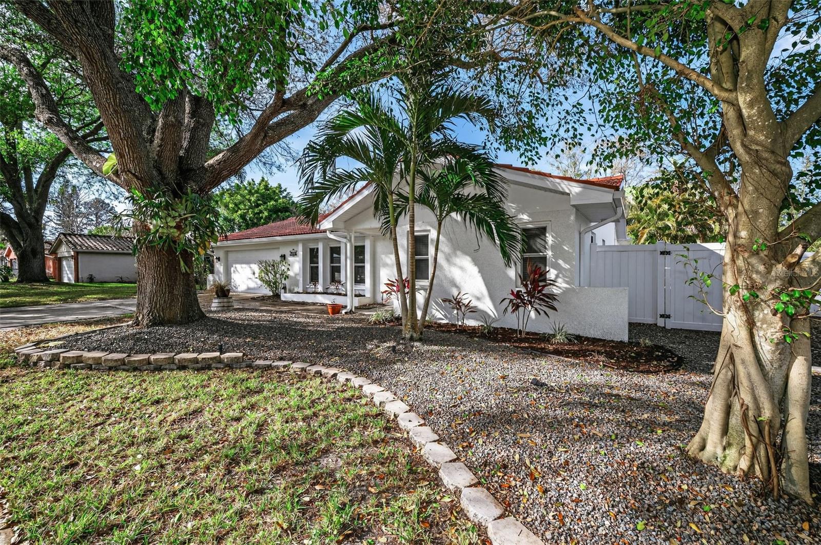 Side view showing the fenced yard