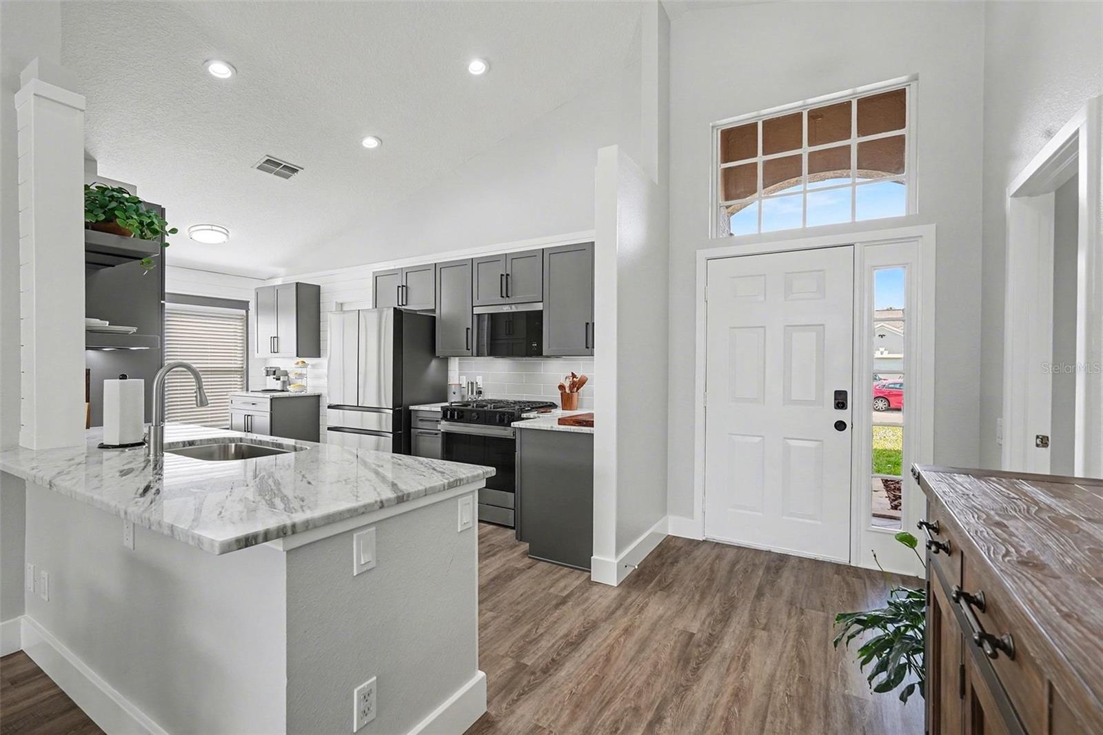 Upgraded Granite, Luxury Vinyl Plank Throughout