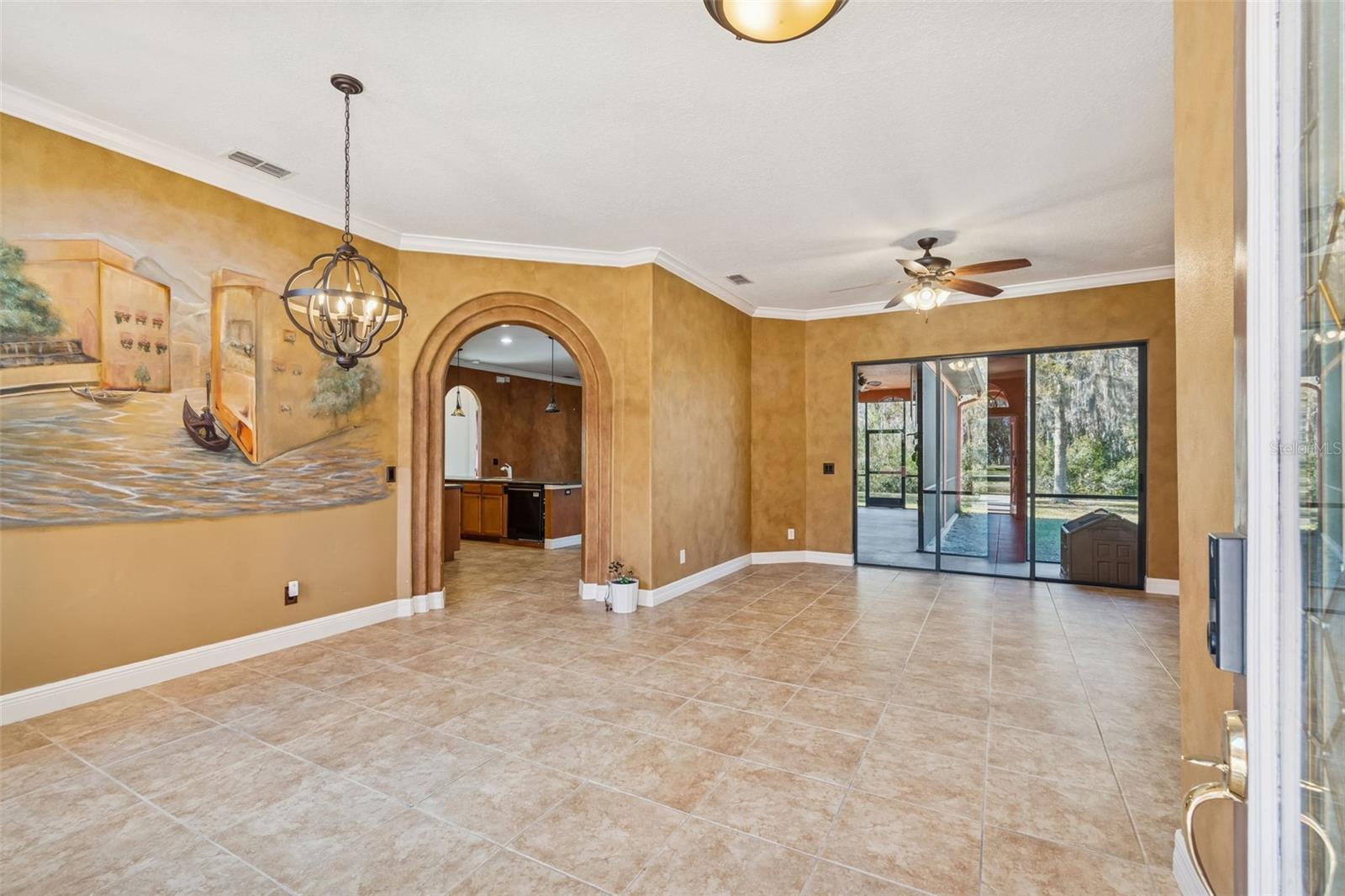 View from front door - formal dining on left, formal living ahead