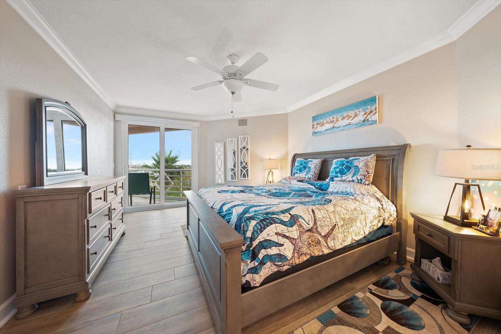 Second bedroom is spacious and has a slider to the balcony