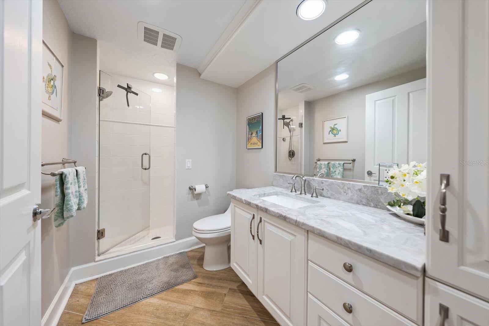 Second bathroom has a walk in shower