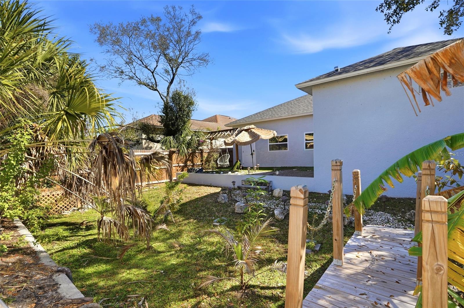 Backyard Garden with Bridge & GATE to Shopping Center