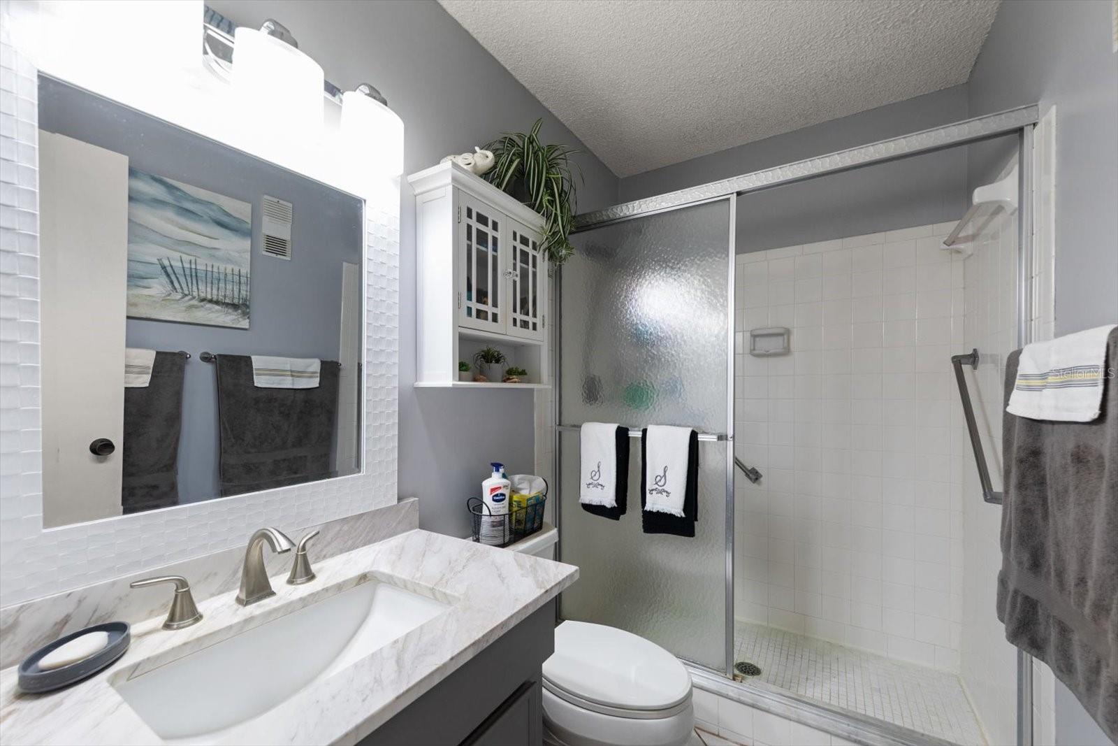 updated vanity with Decor lighting