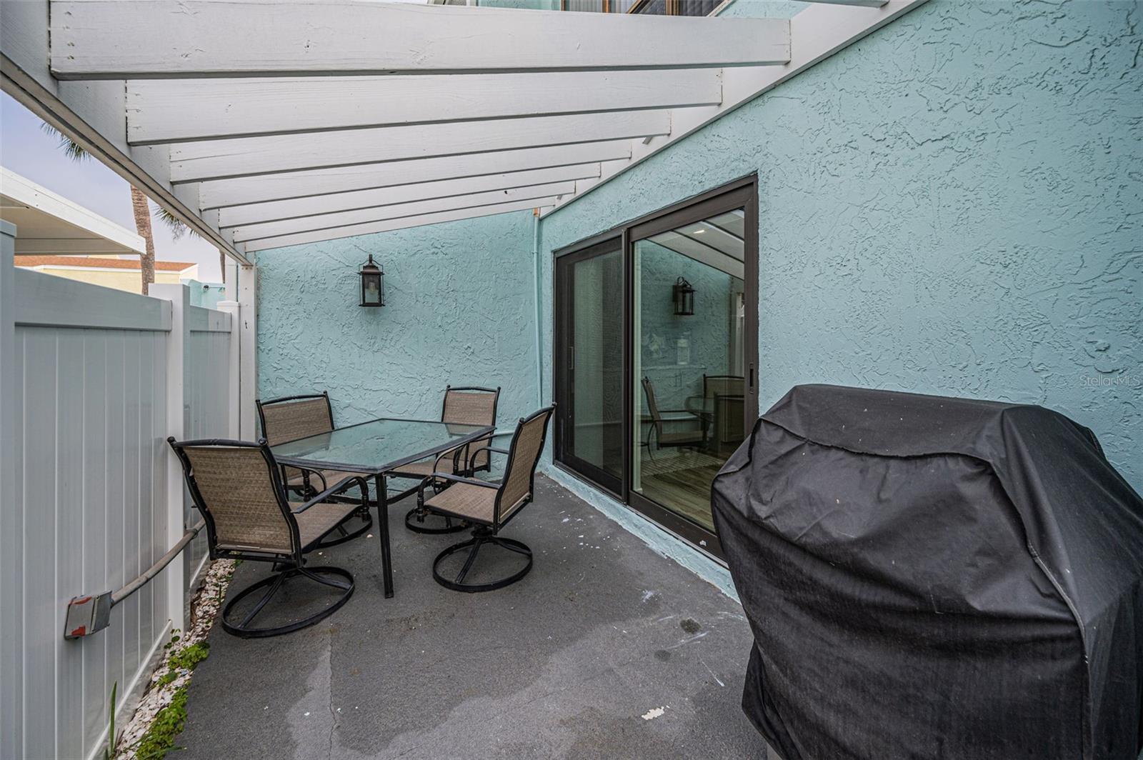 Fenced front patio area