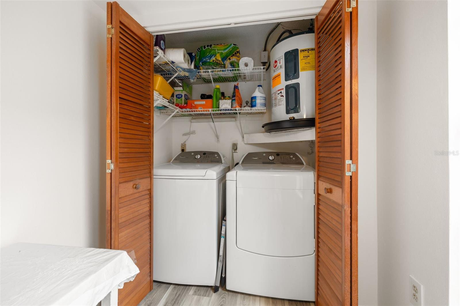 Laundry closet is located just off the kitchen.