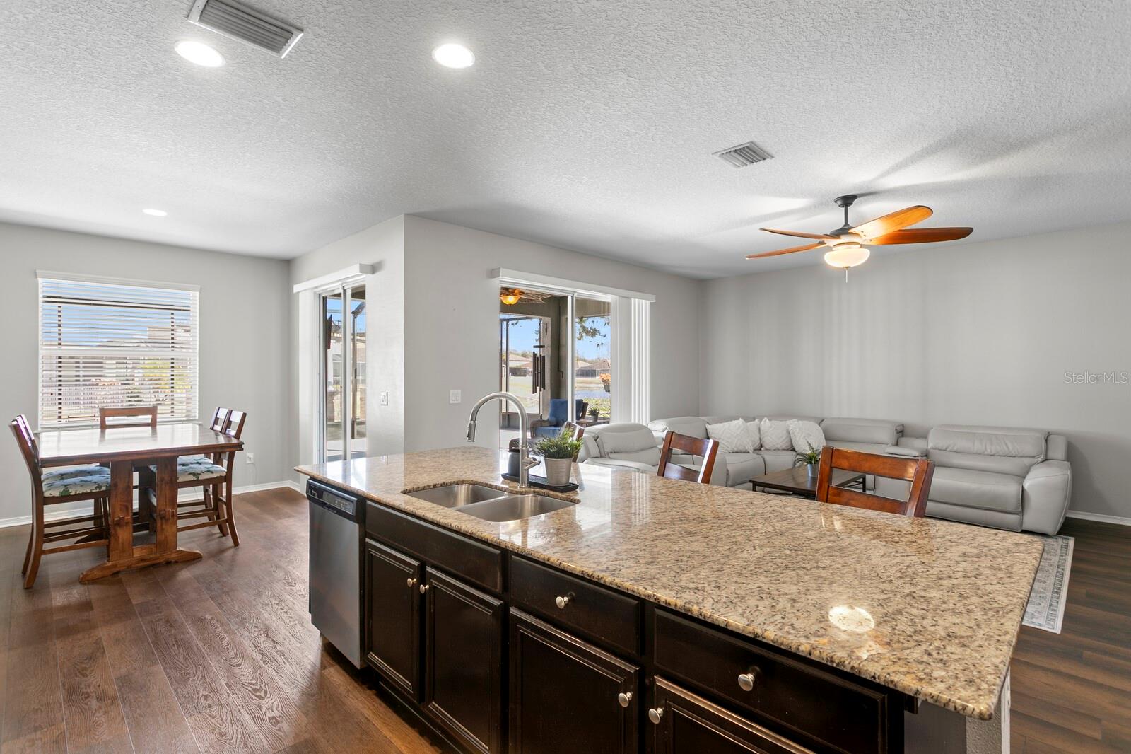 Views from kitchen into family room and dinette