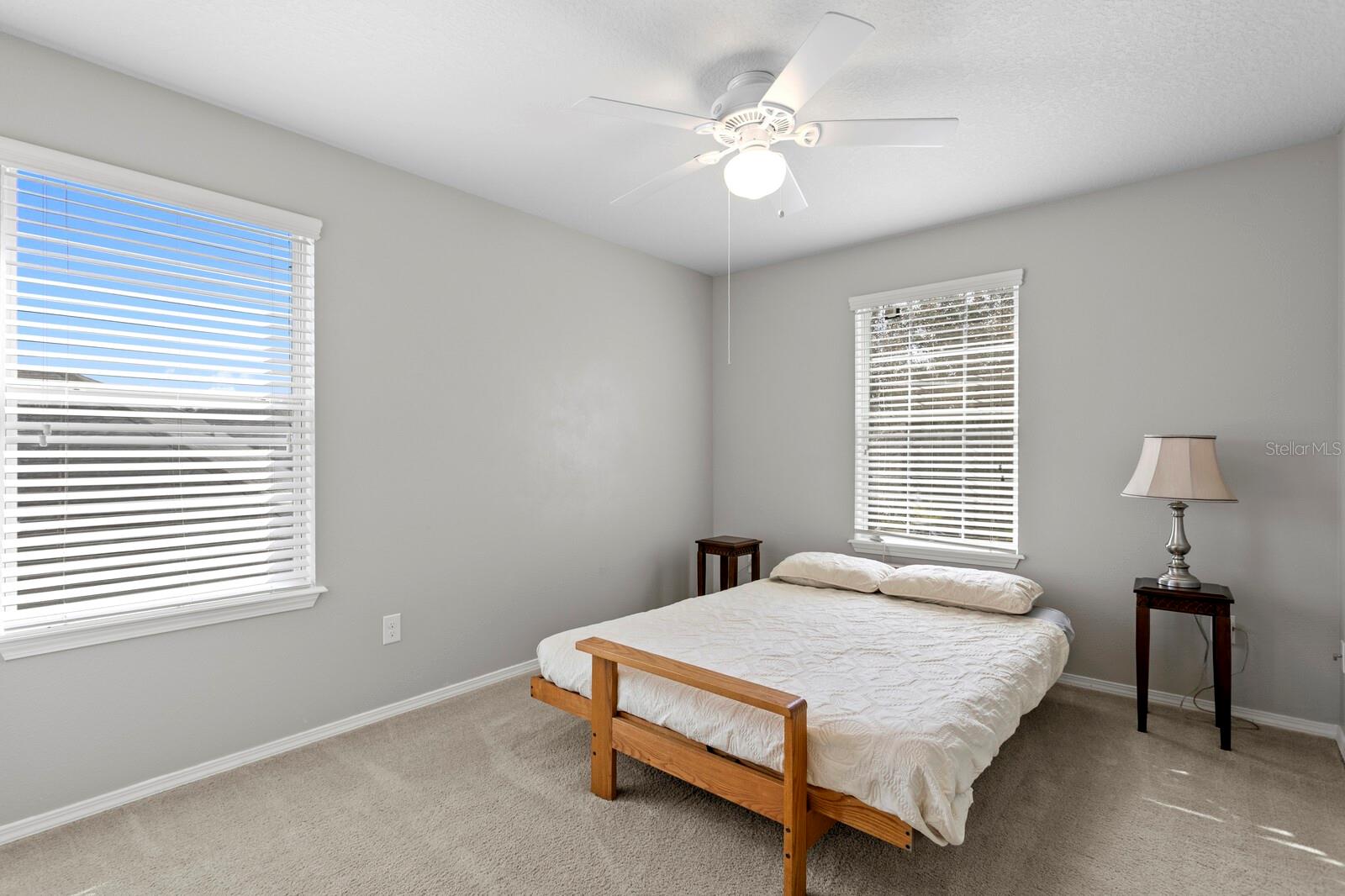 3rd bedroom with ceiling fan
