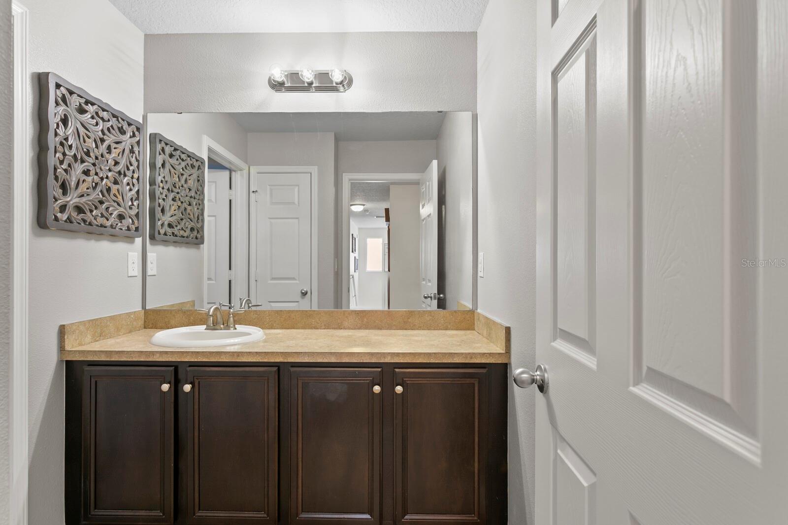 3rd full bath shared by 3rd and 4th bedrooms