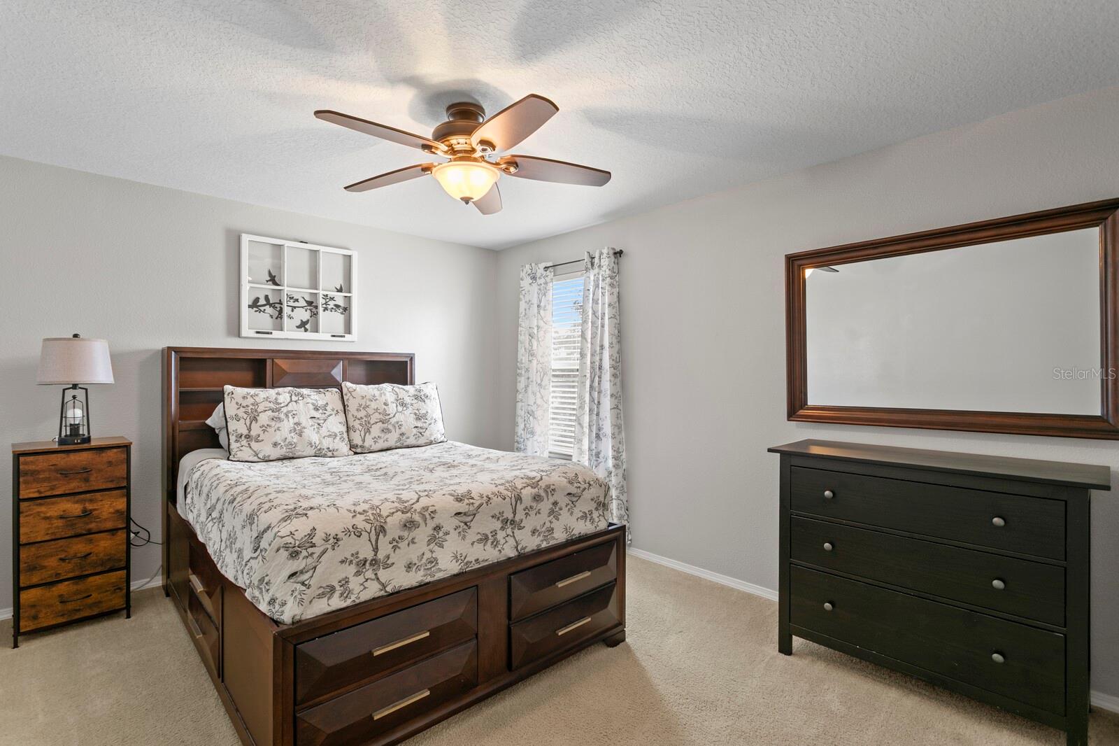 4th bedroom with ceiling fan