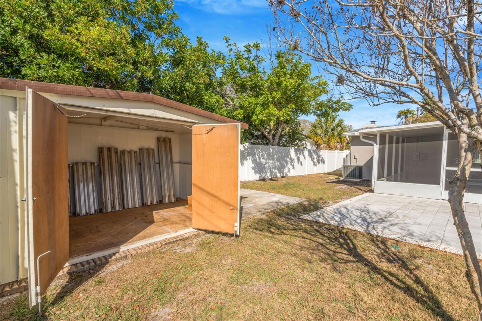 Shed w/ hurricane shutters inside
