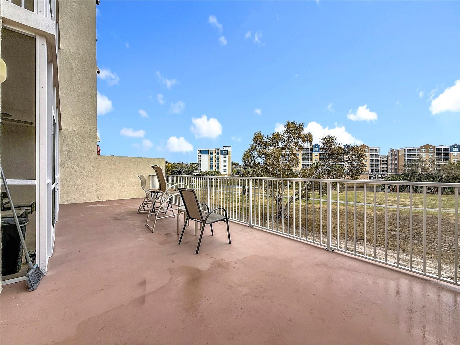 Open Patio - View of East Bay Golf Course and Lake with Fountain