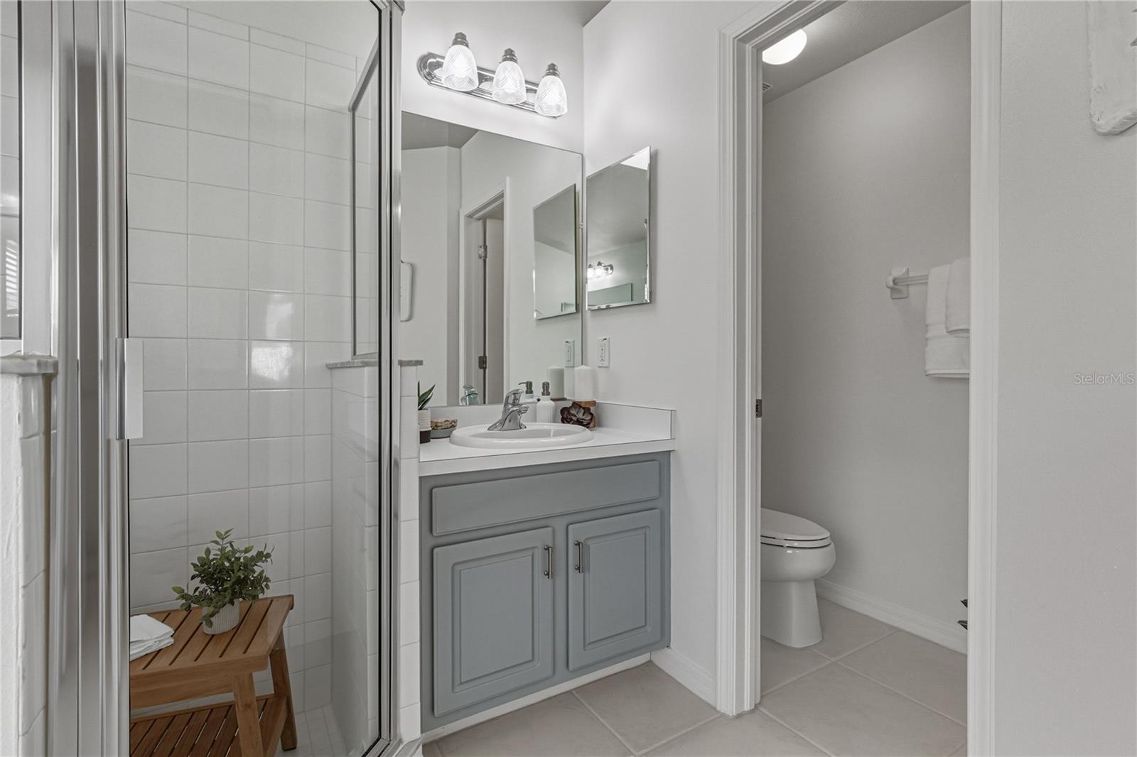 Primary Bath Second Vanity and Large Walk in Shower with Separate Toilet Room