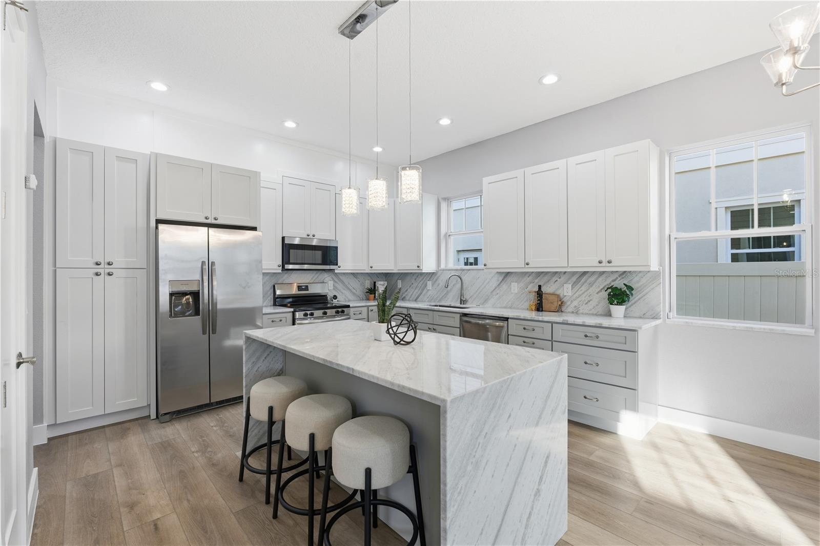 Stunning Light-Filled Kitchen With Abundant Storage And 10' Ceilings