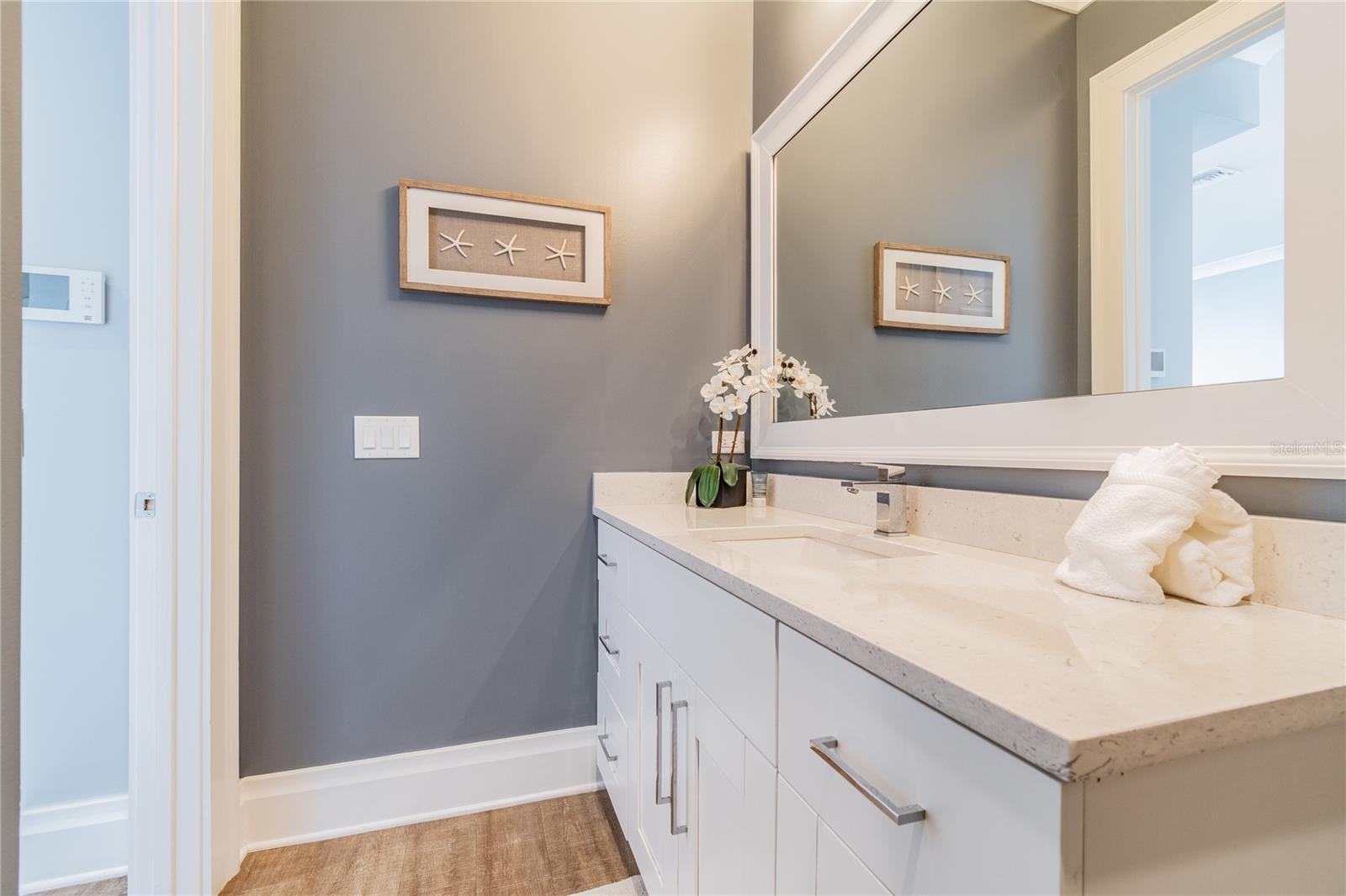 1/2 Bath off Kitchen on second floor