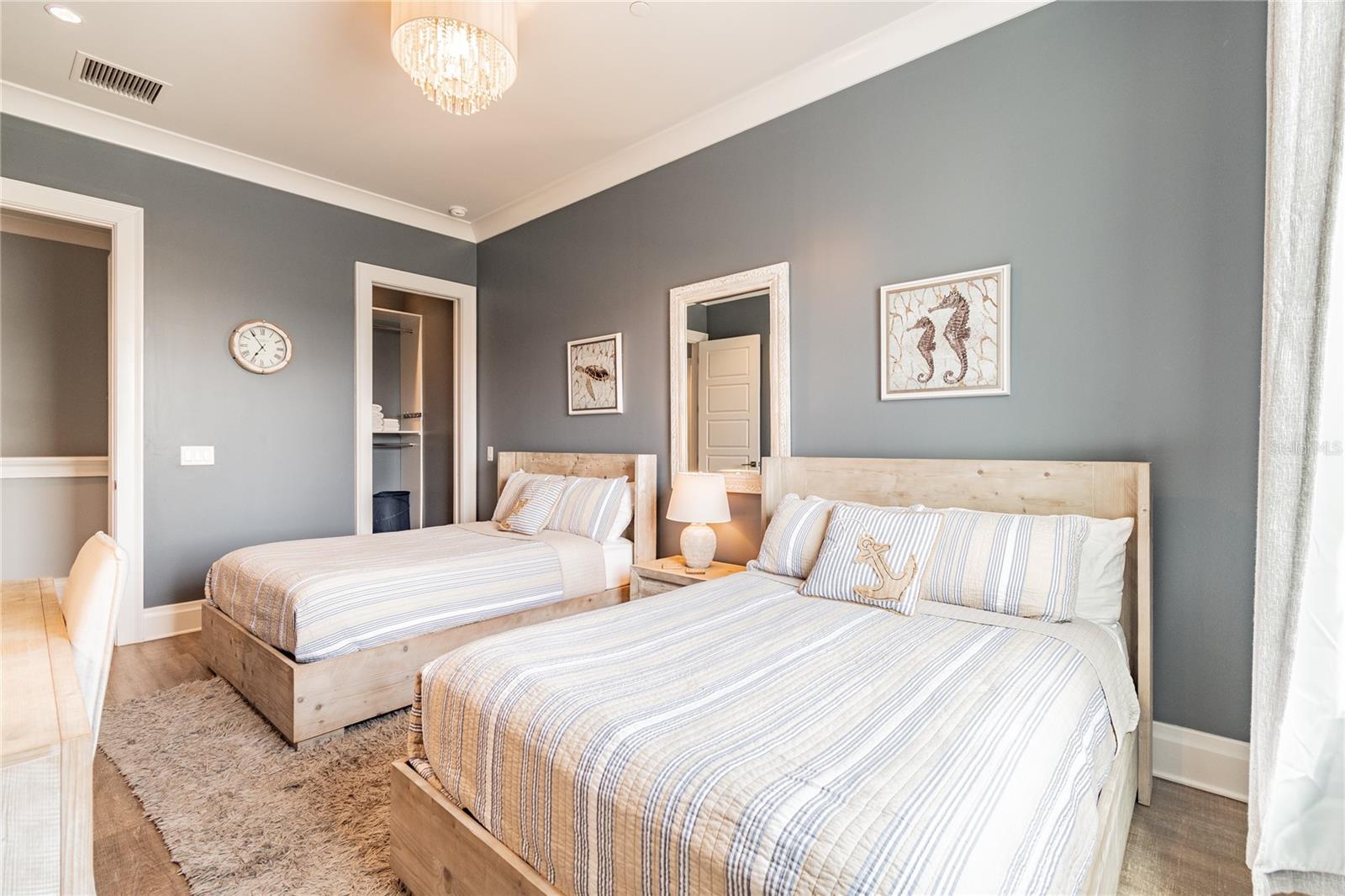 3rd Bedroom with 2 Full/Double Beds with 3 Drawer Storage Each, Flat Screen TV and Custom Walk In Closet