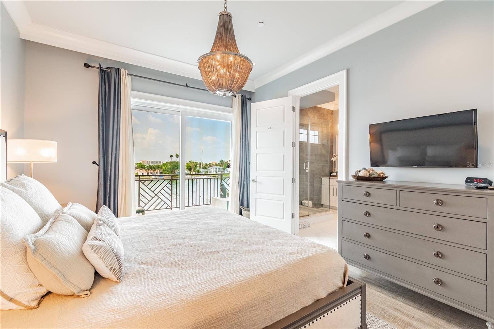 Master Bedroom with King size Bed, Flat Screen TV & Large Balcony overlooking Clearwater Bay
