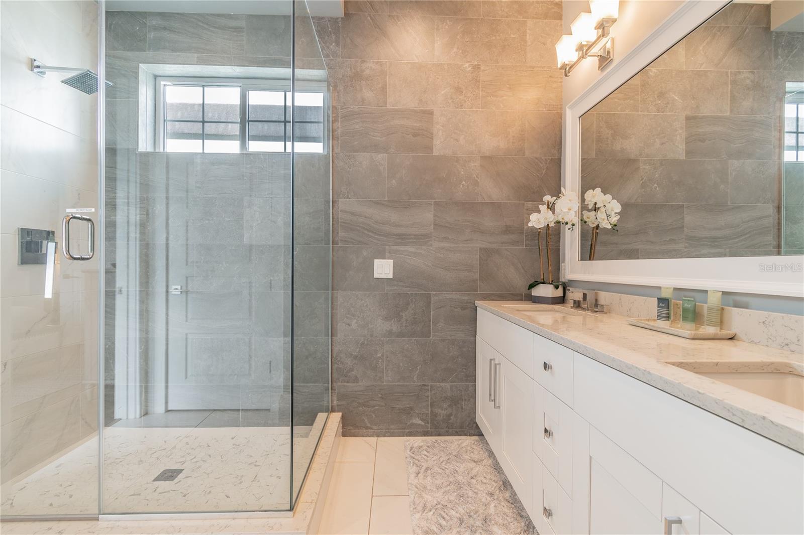 Master Bath with Dual Sinks, Large Walk In Shower, Separate Toilet Area & Custom Walk In Closet