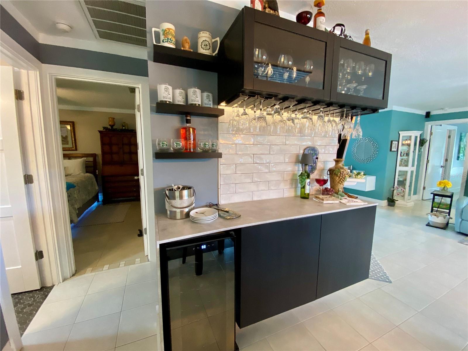 2nd bedroom, guest bath and laundry on opposite of house