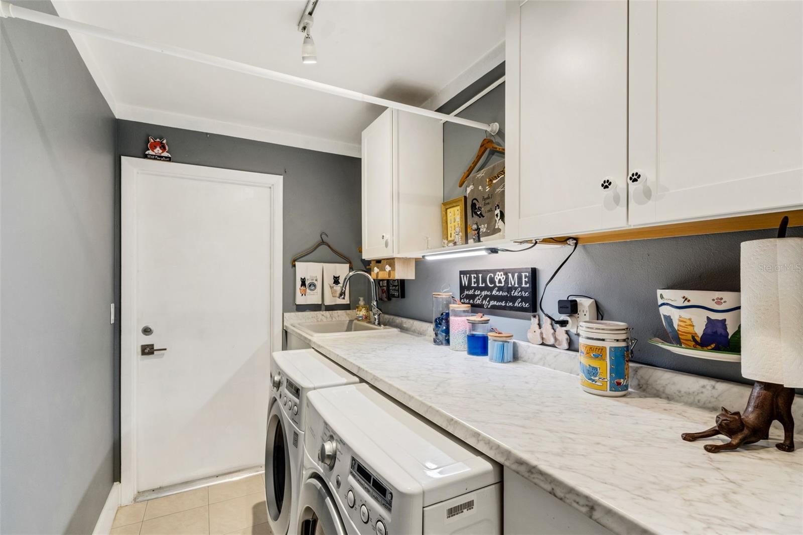Laundry room with garage access