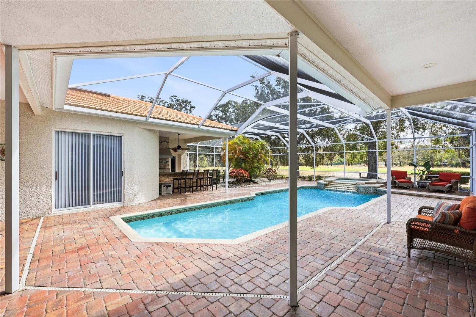 Brick Pavers surround the Pool and Spa
