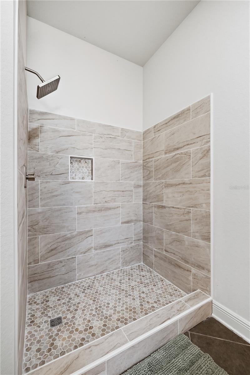 Primary gleaming tile shower stall