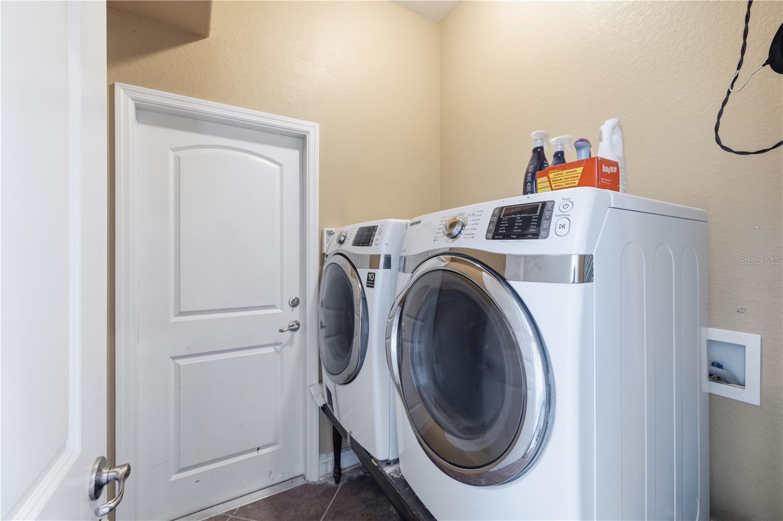 Laundry room with access to garage
