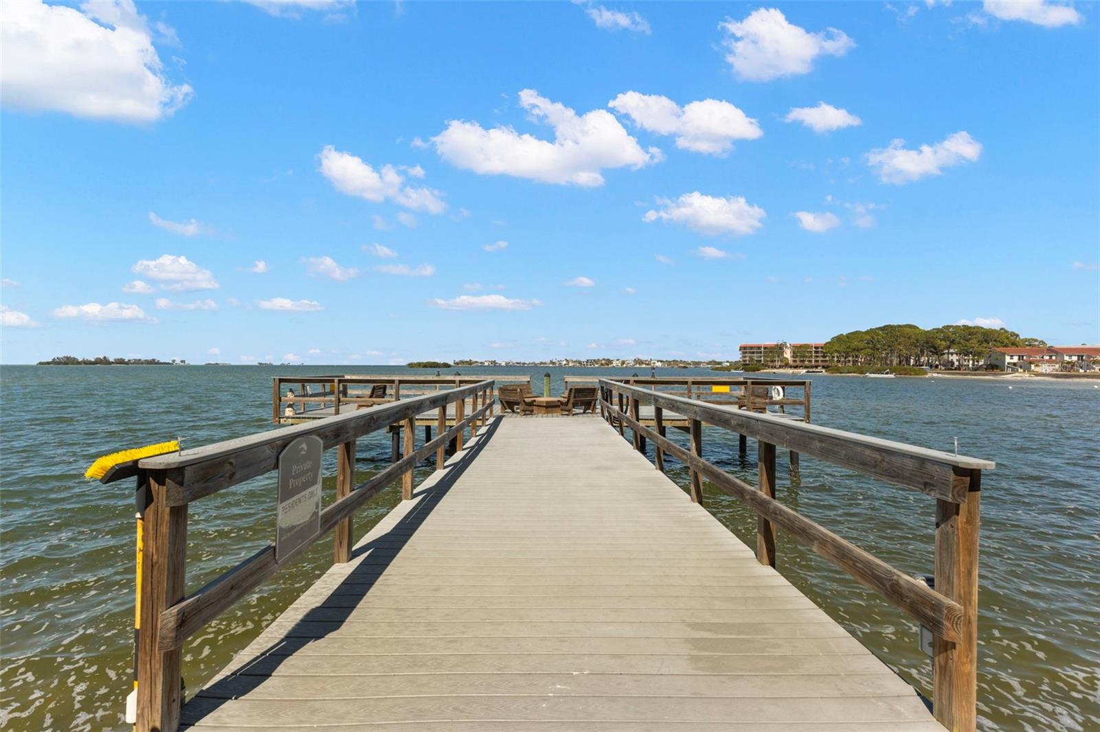 Enjoy the community pier — perfect for sunset views, relaxing by the water, or gathering with neighbors.