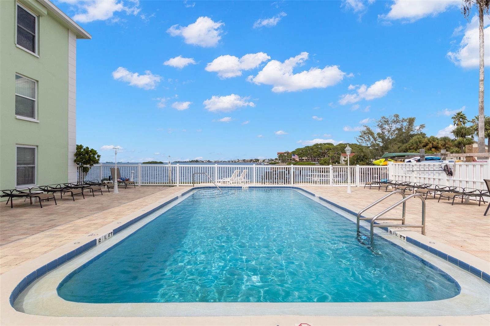 Swim with a view — bay front community pool perfectly positioned to enjoy open water scenery and coastal breezes.