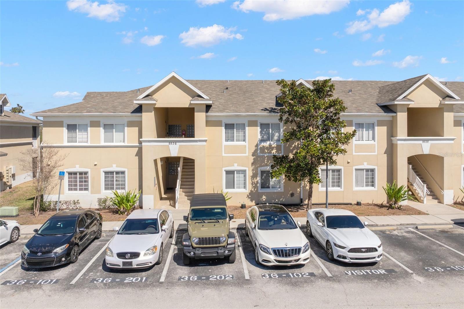 Assigned and visitor parking are located directly in front of the building for added everyday ease. Clean landscaping and mature trees enhance the community setting and curb appeal.